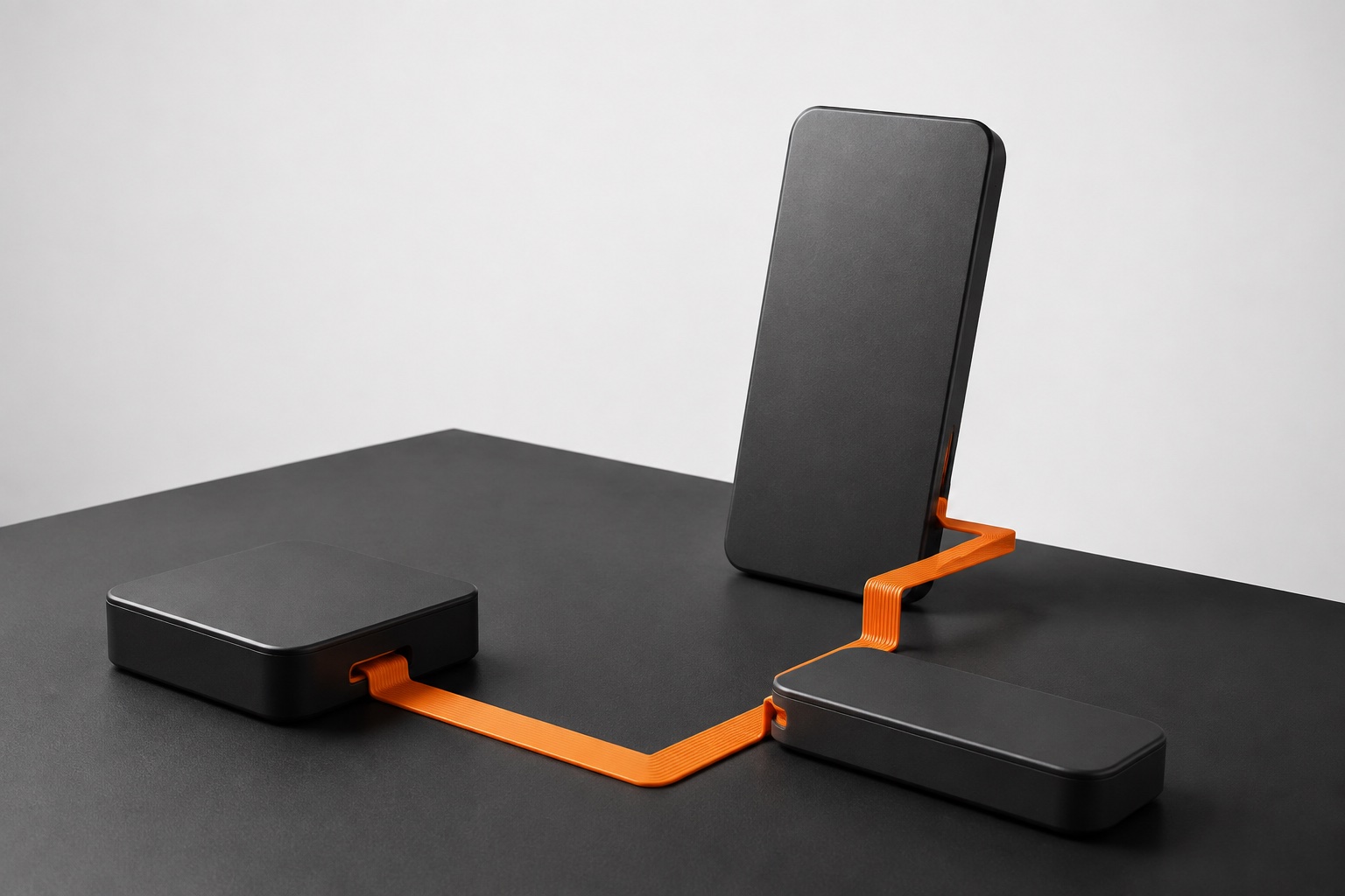 石墨色设备与橙色连接带的原创示意图
